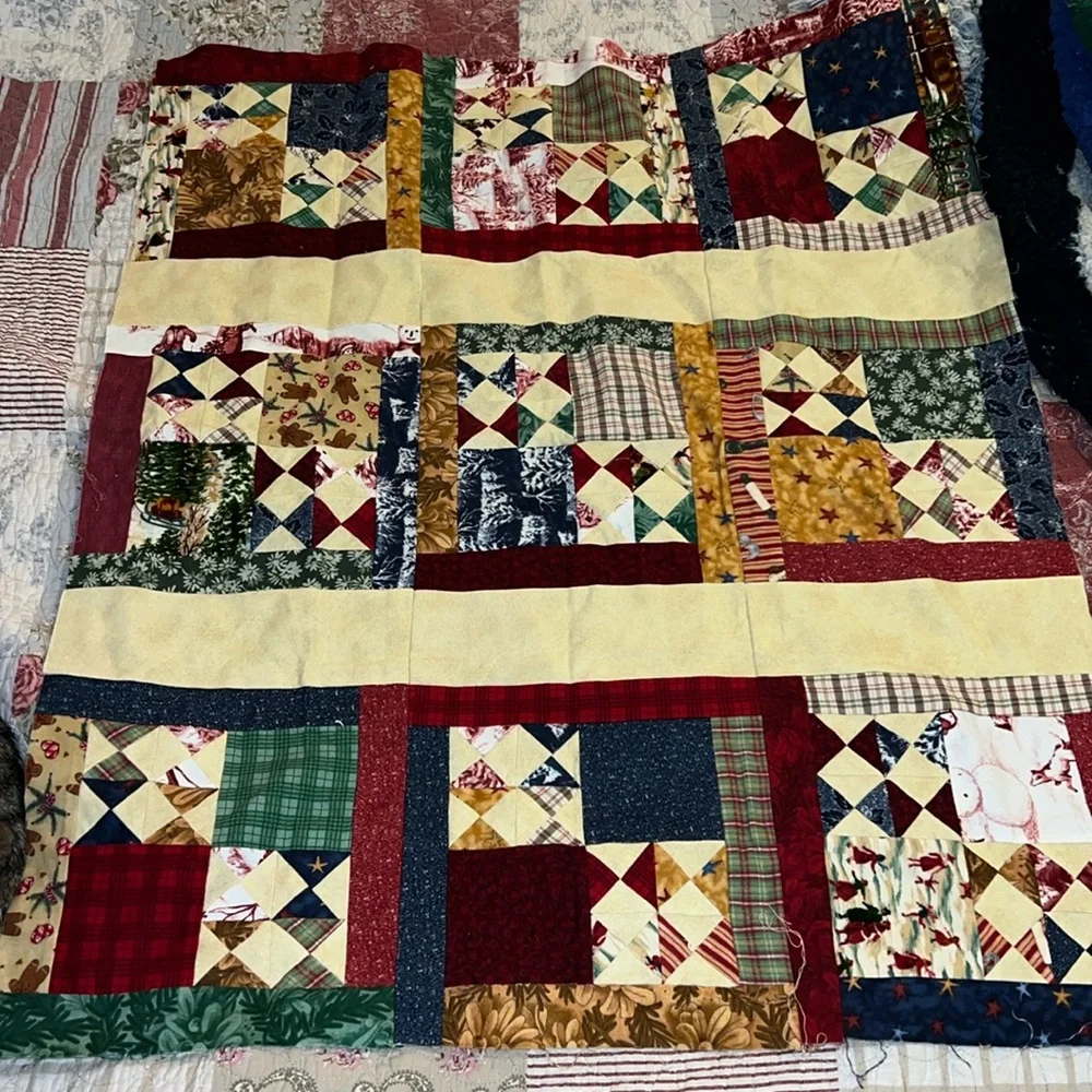 Unfinished quilt top Christmas themed 29” x 34”